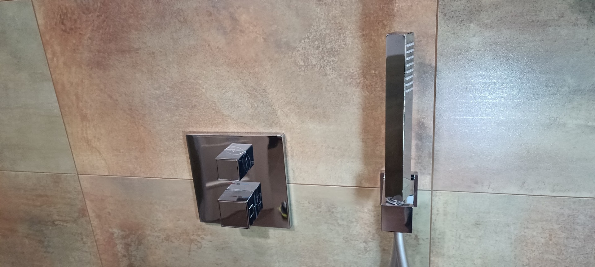 Vyčištěná baterie sprchy